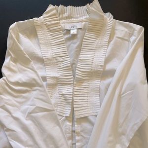 Festive ruffle neck blouse. EUC from smoke/pet free home.